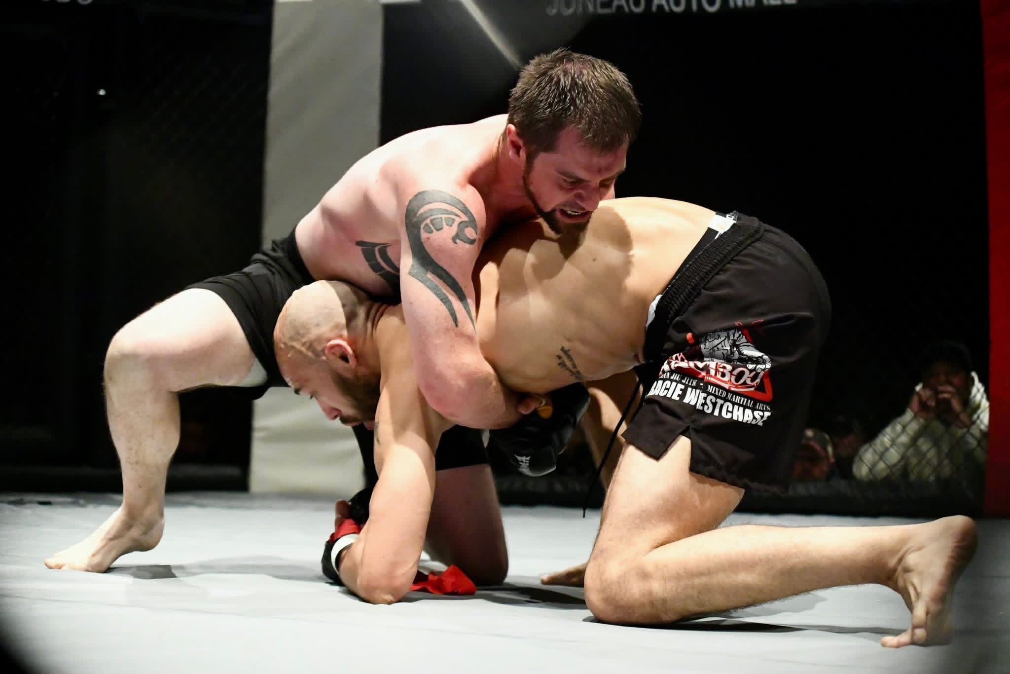 Intense grappling action in the cage